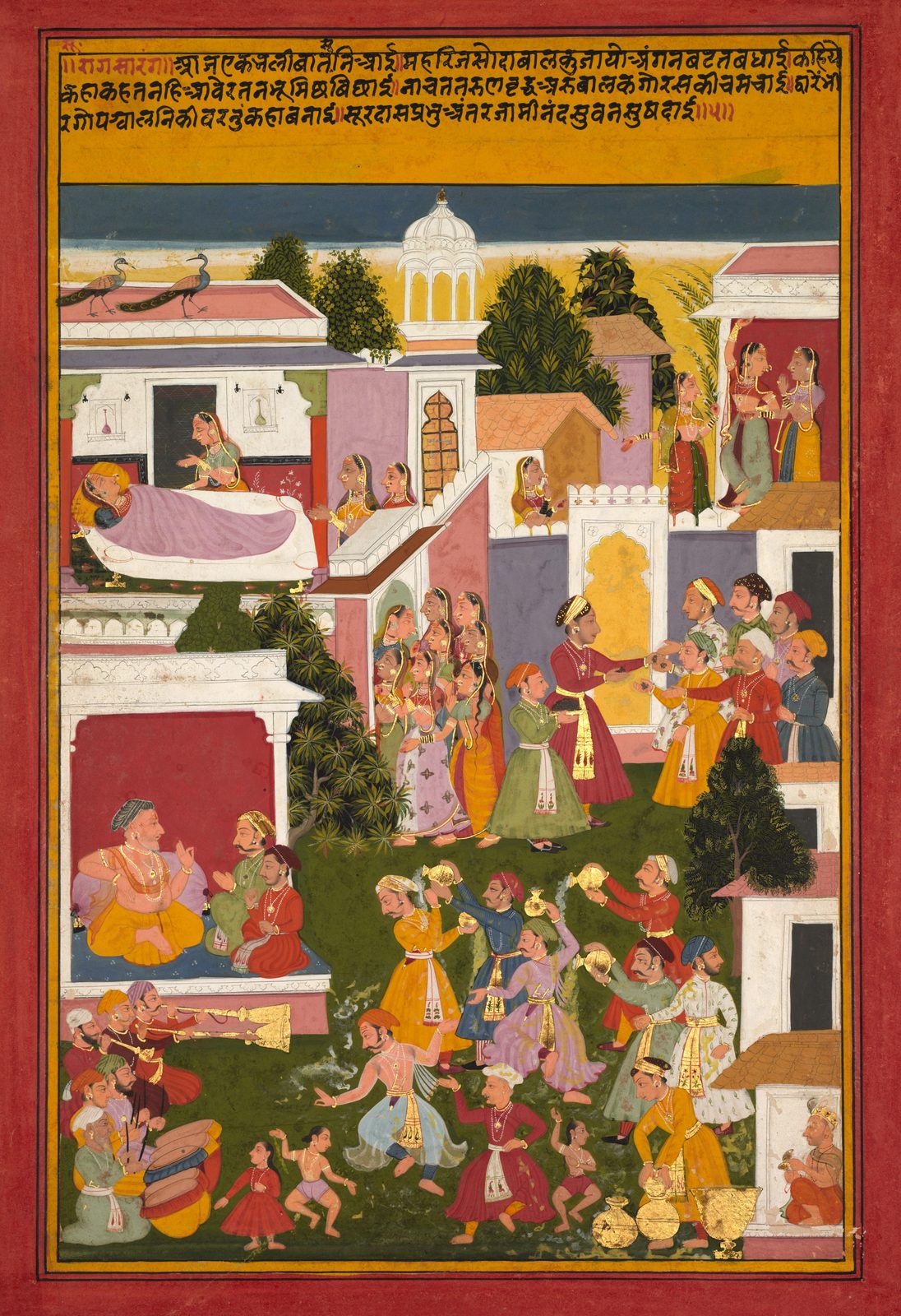 An Indian miniature painting in gum tempera, ink and gold on paper, taller than it is wide, showing the celebration after a birth in a cowherd village. In an upper chamber the mother sits with the blue-skinned newborn Krishna, women around her. Through the rest of the painting the village is busy: women arriving to see the child, men handing out silver coins, people pouring curds and ghee over one another and dancing, musicians with horns and drums, and in a small hut at the lower right the blind poet Surdas playing a pair of cymbals.