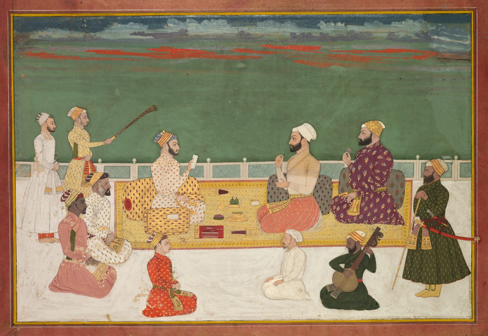 A Mughal miniature painting. On a white marble terrace against a flat green ground and a dusk sky, a bearded man in a wh