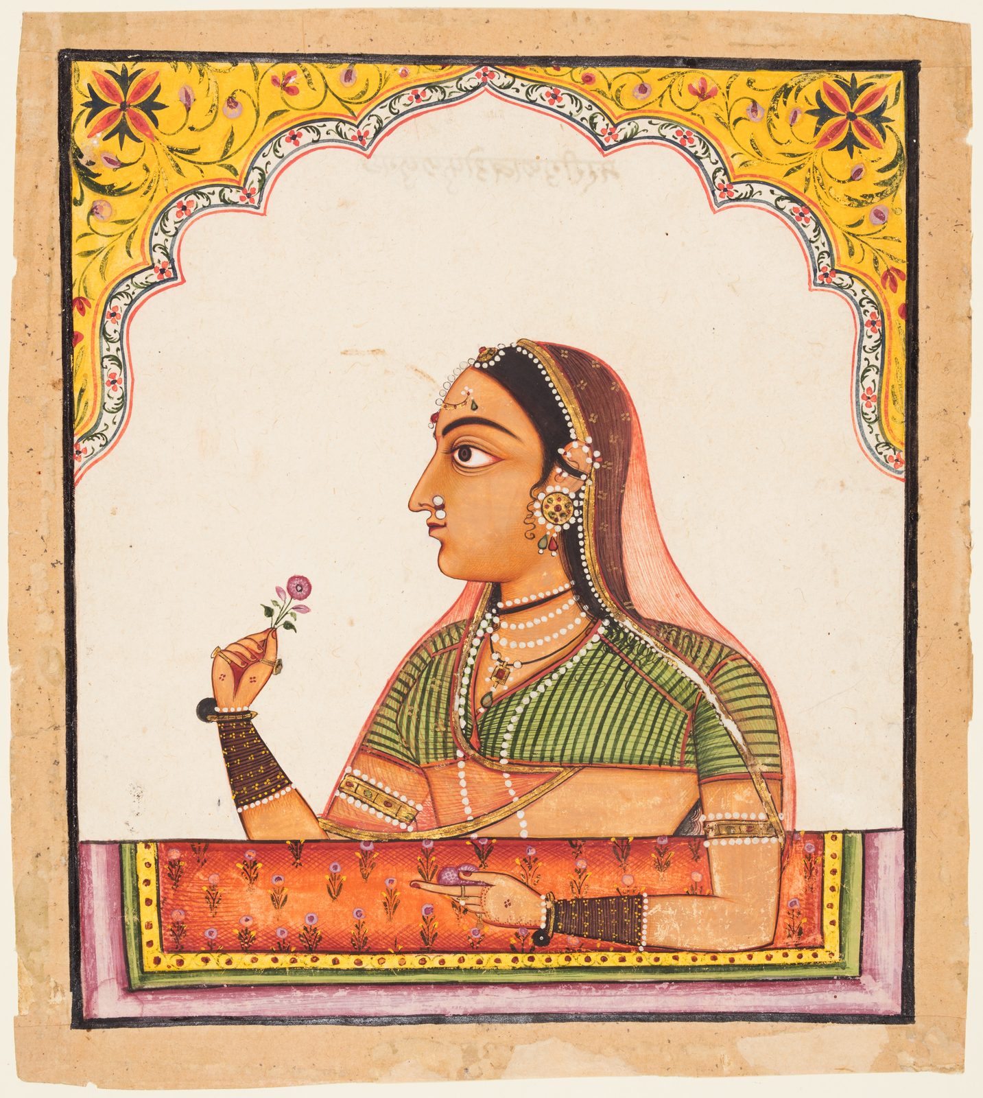 An Indian miniature painting of a single woman leaning at a palace window. She is shown in profile from the waist up, fr